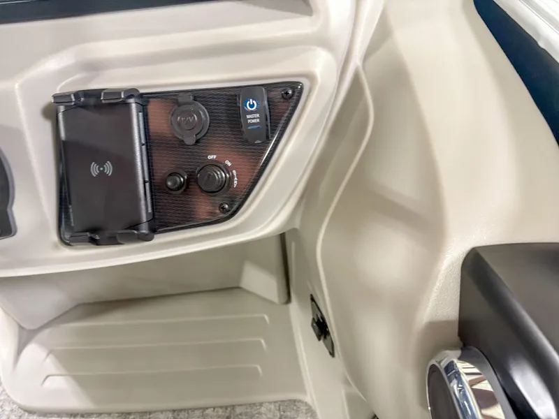 Slide: The Image of Control panel of 2025 Trifecta 22 UL LE T with wireless charging dock. - 14