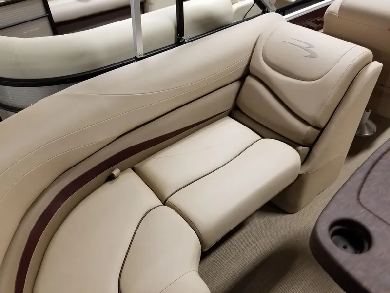 Slide: The Image of 2017 Bennington 22GSR boat interior with beige cushioned seating. - 34