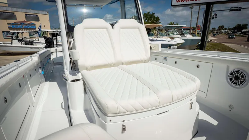 Slide: The Image of 2025 Everglades 315 CC boat with luxurious white seating and modern design. - 17
