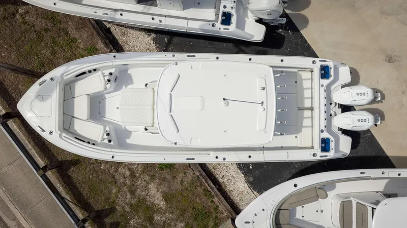 Slide: The Image of Overhead view of 2025 Everglades 315 CC boat with dual engines. - 4