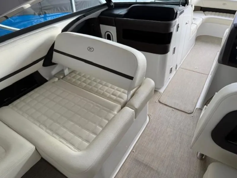 Slide: The Image of 2020 Cobalt R30 boat interior with white seating and modern design. - 10