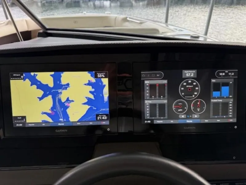 Slide: The Image of Dashboard of a 2020 Cobalt R30 boat with Garmin navigation displays. - 13