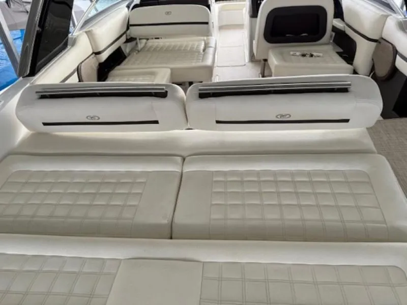 Slide: The Image of Luxurious interior of a 2020 Cobalt R30 boat with white cushioned seating. - 7