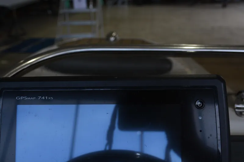 Slide: The Image of GPS display on 2016 Walker Bay Generation 340 DLX boat dashboard. - 12