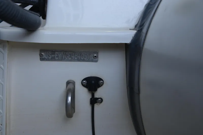 Slide: The Image of 2016 Walker Bay Generation 340 DLX boat detail with serial number plate and handle. - 14