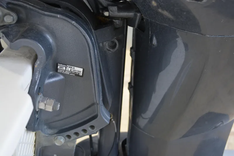 Slide: The Image of Close-up of a 2016 Walker Bay Generation 340 DLX boat engine component. - 6