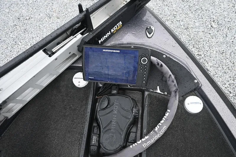 Slide: The Image of Fishfinder and trolling motor on 2012 Stratos 189VLO boat deck. - 9
