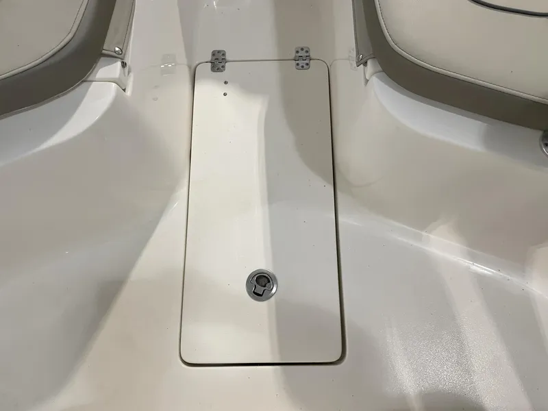 Slide: The Image of 2023 Key West 239 FS boat interior with storage compartment. - 23