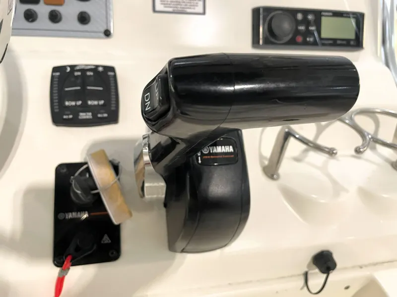 Slide: The Image of Yamaha throttle control on 2023 Key West 239 FS boat dashboard. - 36