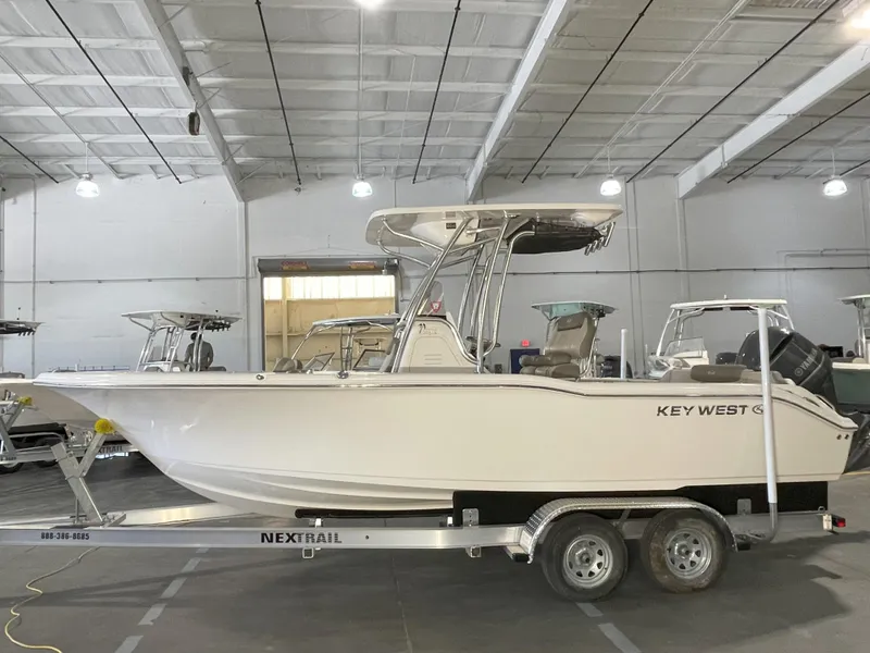 Slide: The Image of 2023 Key West 239 FS boat on trailer in indoor showroom. - 4