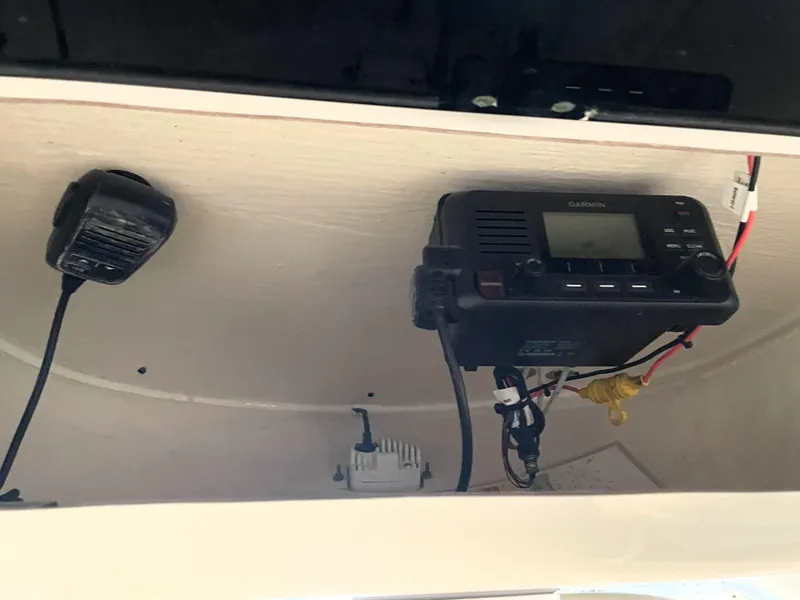 Slide: The Image of 2023 Key West 239 FS boat radio and microphone setup. - 45