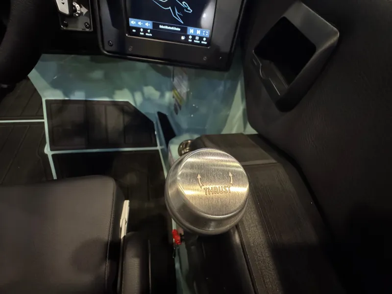 Slide: The Image of 2025 Moomba Max interior with control knob and touchscreen display. - 27