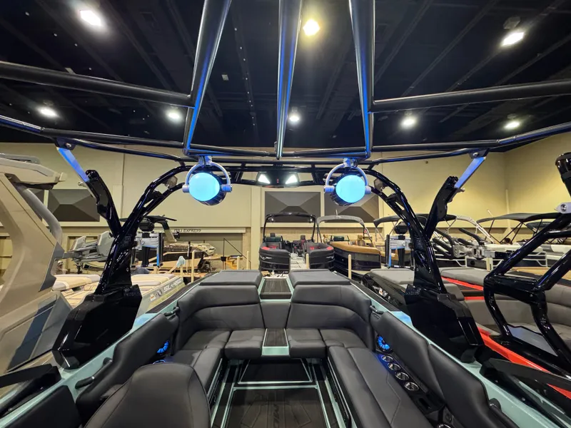 Slide: The Image of 2025 Moomba Max boat interior with modern seating and advanced audio system. - 36