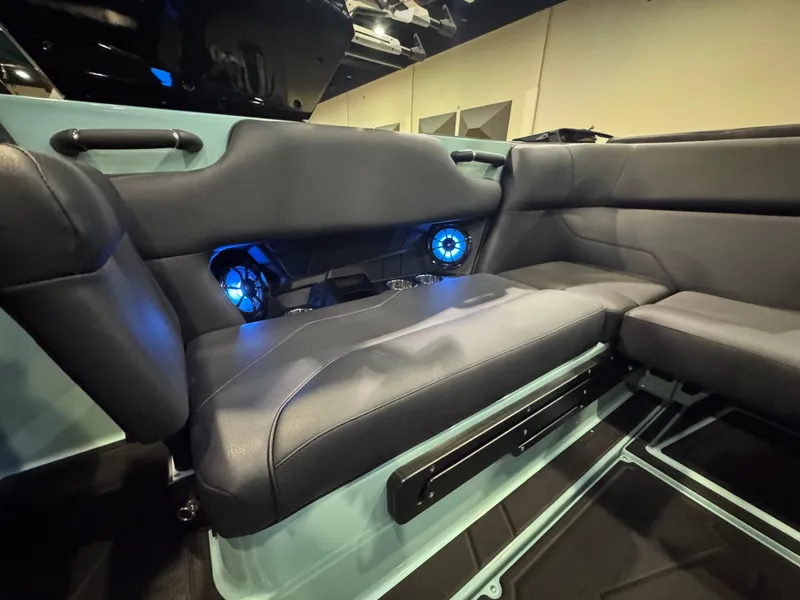 Slide: The Image of 2025 Moomba Max interior with blue LED speakers and sleek seating design. - 38