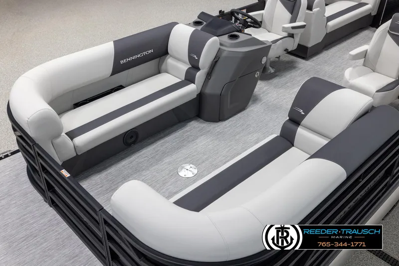 Slide: The Image of 2025 Bennington 22 SSRSE pontoon boat interior with plush seating and modern design. - 10