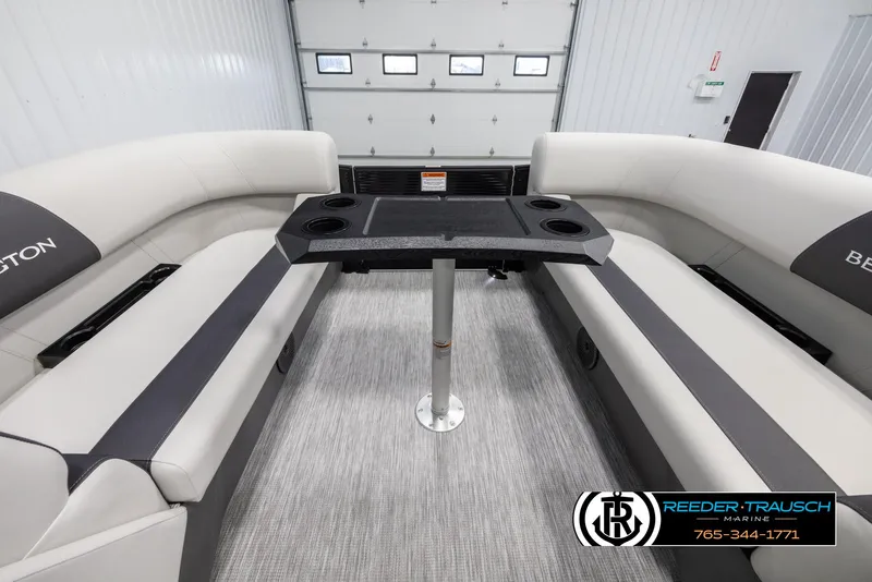 Slide: The Image of Interior of 2025 Bennington 22 SSRSE pontoon boat with seating and table. - 21