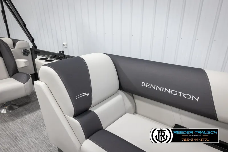 Slide: The Image of 2025 Bennington 22 SSRSE boat interior with branded seating and modern design. - 22