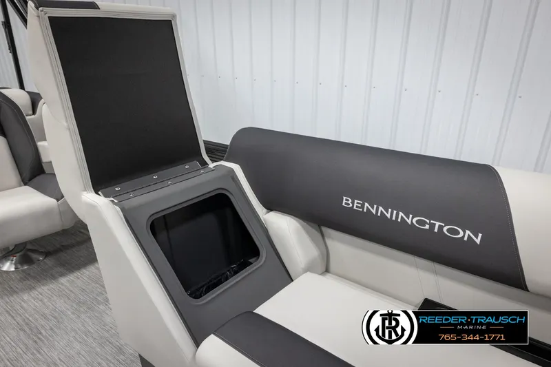 Slide: The Image of 2025 Bennington 22 SSRSE boat seat with storage compartment, featuring sleek design and branding. - 23