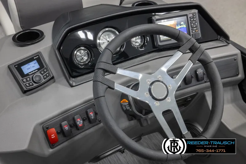Slide: The Image of Dashboard of 2025 Bennington 22 SSRSE boat with steering wheel and control panel. - 25