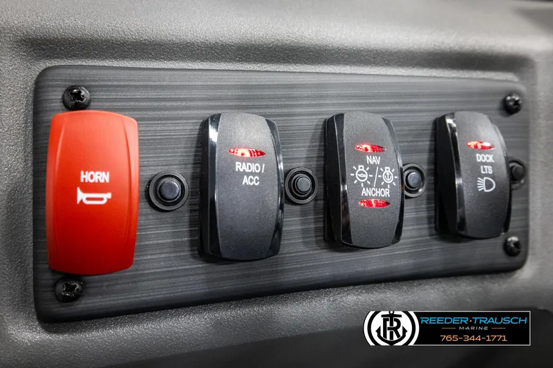 Slide: The Image of Control panel of 2025 Bennington 22 SSRSE boat with labeled switches. - 27