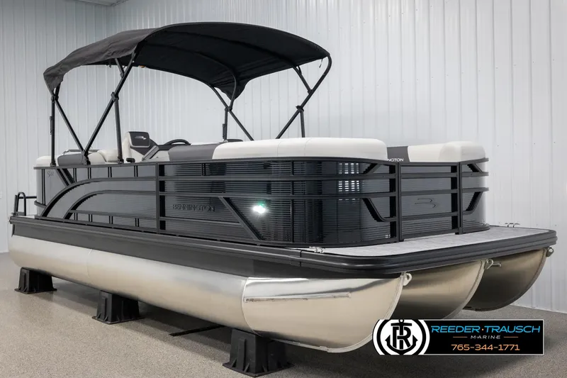 Slide: The Image of 2025 Bennington 22 SSRSE pontoon boat with canopy in showroom. - 3