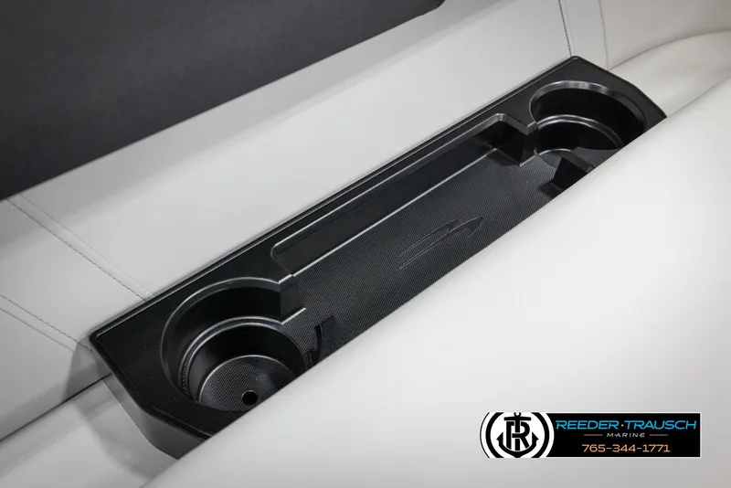 Slide: The Image of Cup holders in 2025 Bennington 22 SSRSE boat, featuring sleek black design. - 36
