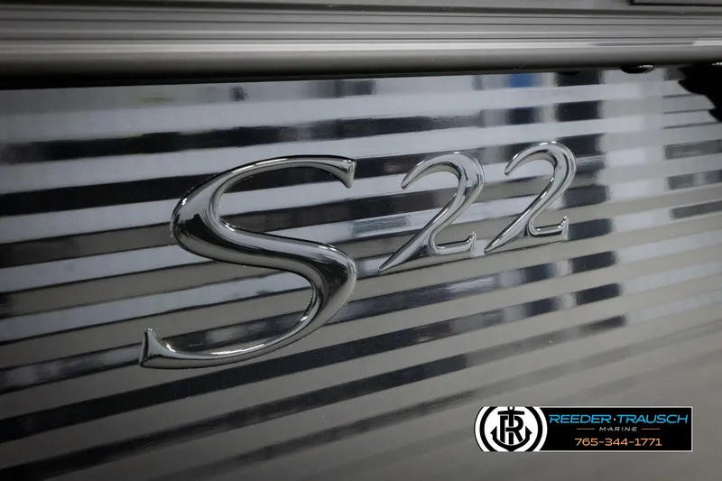 Slide: The Image of 2025 Bennington 22 SSRSE boat emblem with Reeder-Trausch Marine logo. - 42