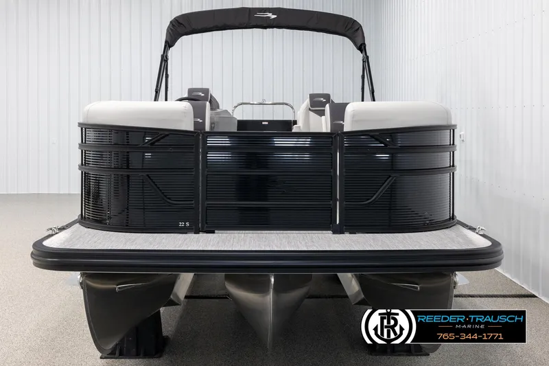 Slide: The Image of 2025 Bennington 22 SSRSE pontoon boat in showroom, front view. - 8