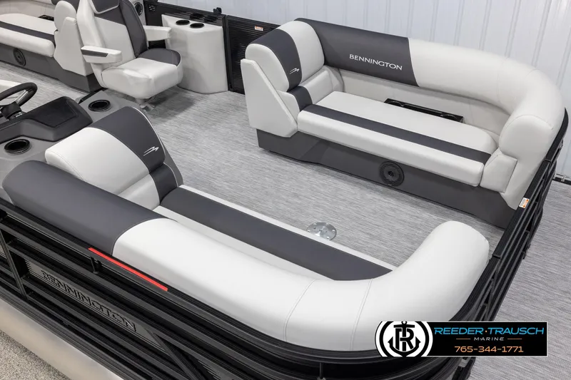 Slide: The Image of 2025 Bennington 22 SSRSE pontoon boat interior with plush seating and modern design. - 9