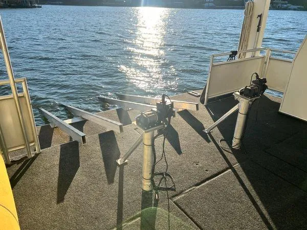 Slide: The Image of 2005 Sumerset 90x18 houseboat deck with water view and sunlight reflection. - 19