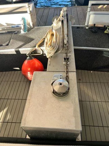 Slide: The Image of 2005 Sumerset 90x18 boat deck with anchor chain and buoy. - 22