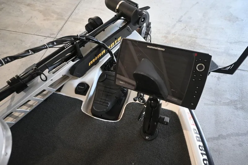 Slide: The Image of 2006 Bass Cat Puma boat with Minn Kota trolling motor and Humminbird fish finder. - 12