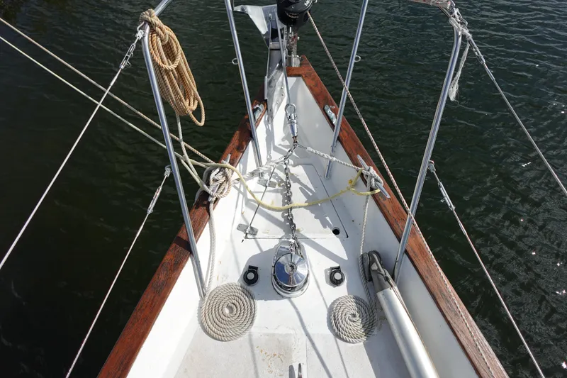 Slide: The Image of Bow of 1982 Morgan 383 sailboat with ropes and anchor chain. - 8