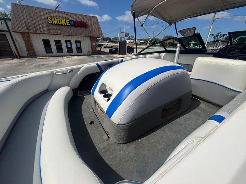 Slide: The Image of 2001 Malibu Response LX boat interior with white and blue seating. - 24
