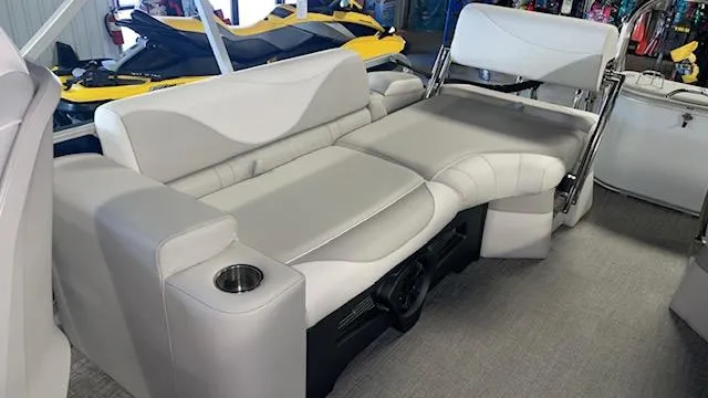 Slide: The Image of Luxurious seating on 2025 Tahoe LTZ 2385 QLS pontoon boat, featuring cup holders and modern design. - 10