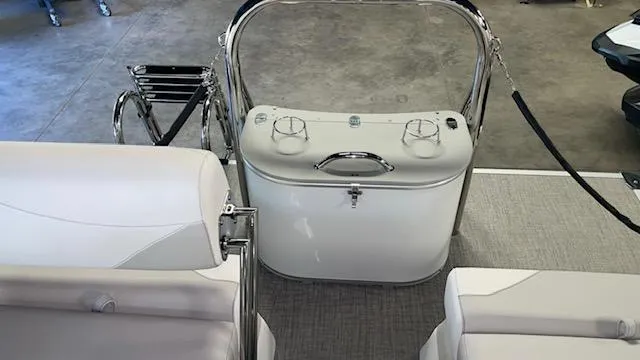 Slide: The Image of 2025 Tahoe LTZ 2385 QLS boat interior with seating and storage compartment. - 12