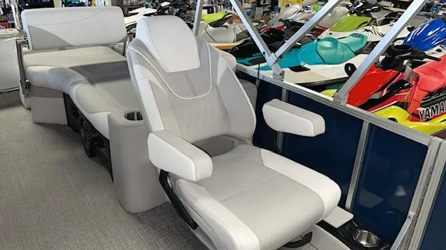 Slide: The Image of 2025 Tahoe LTZ 2385 QLS boat interior with plush seating and modern design. - 9