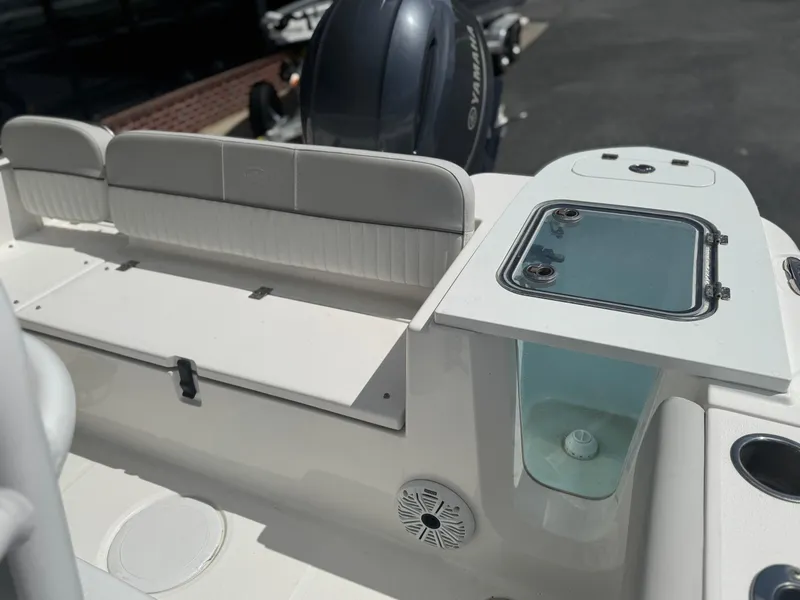 Slide: The Image of 2021 Sea Fox 228 Commander boat interior with seating and storage compartments. - 10