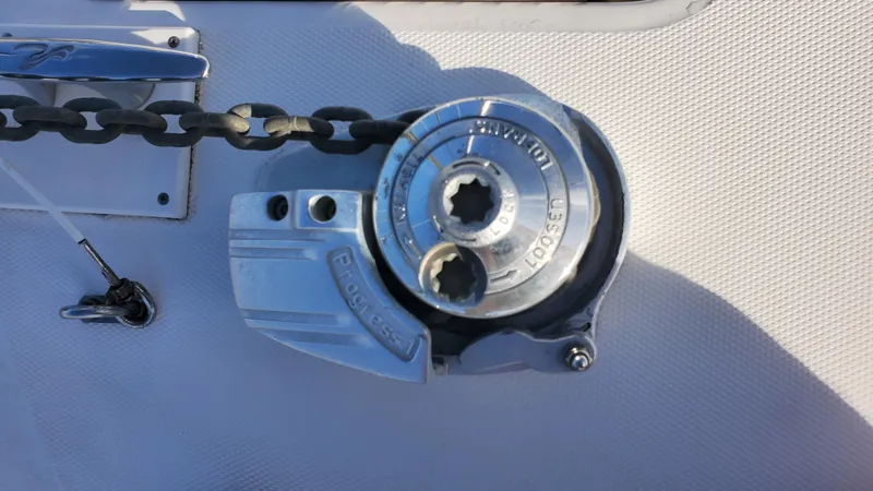 Slide: The Image of Windlass on 2001 Sea Ray 310 Sundancer boat deck with chain. - 44