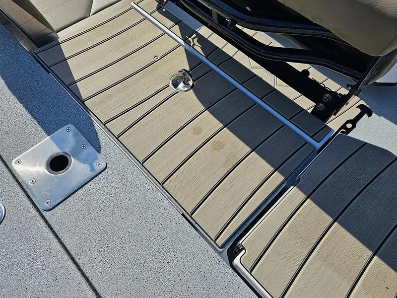 Slide: The Image of 2025 Vexus ACX 2000 boat interior with sleek seating and durable flooring. - 12