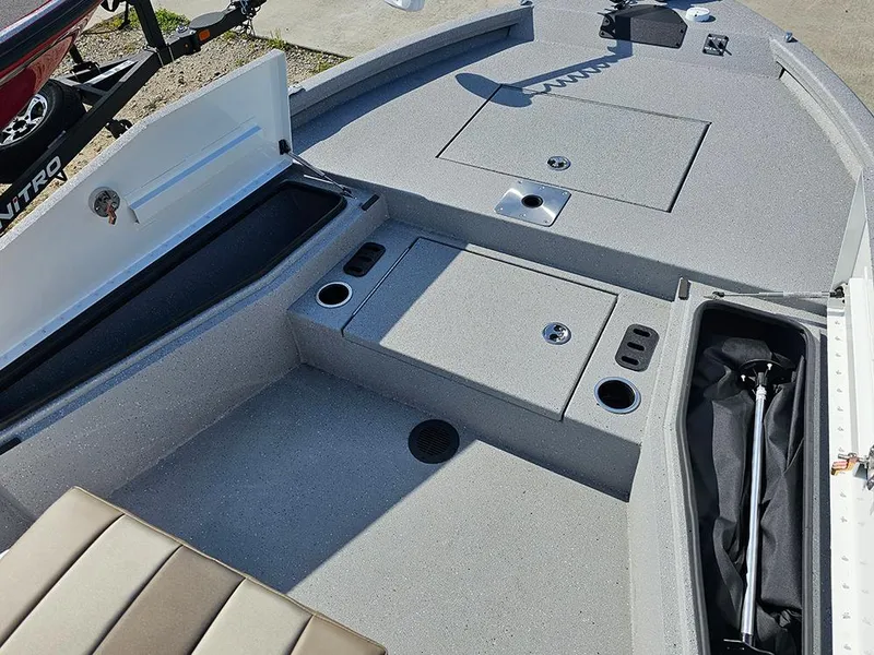 Slide: The Image of 2025 Vexus ACX 2000 boat interior with storage compartments and seating. - 22