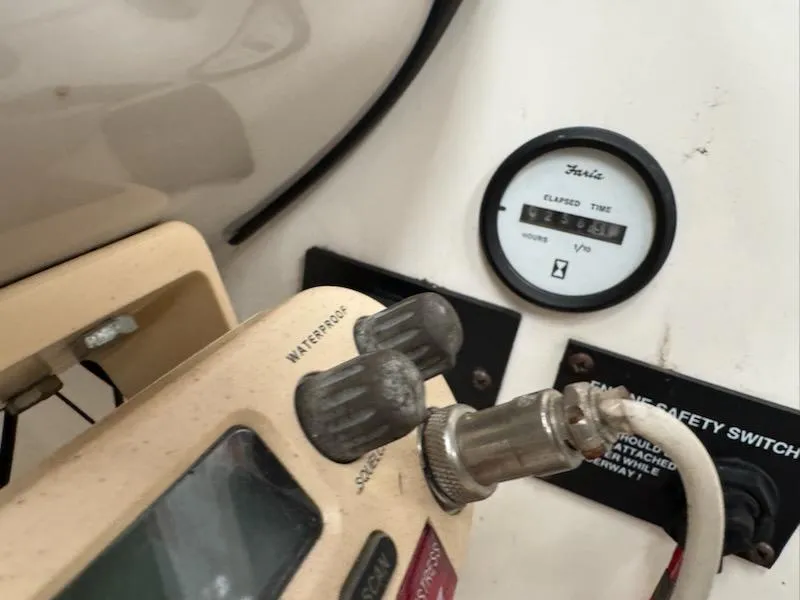 Slide: The Image of Close-up of 2006 Glastron MX 195 boat controls and hour meter. - 7