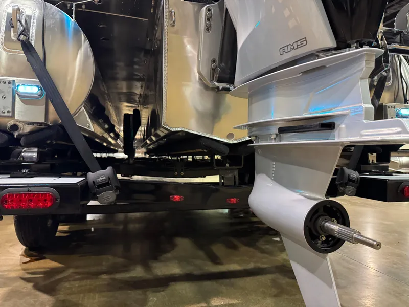 Slide: The Image of 2025 Premier 250 Solaris Rear Social boat engine and propeller close-up. - 16