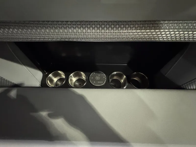 Slide: The Image of Cup holders in 2025 Premier 250 Solaris Rear Social boat interior. - 23