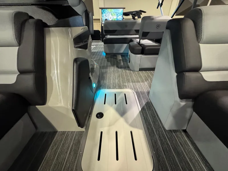 Slide: The Image of 2025 Premier 250 Solaris Rear Social boat interior with sleek seating and modern design. - 24