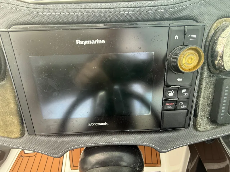 Slide: The Image of Raymarine Hybridtouch display on 2018 Monterey 298 Super Sport boat dashboard. - 16