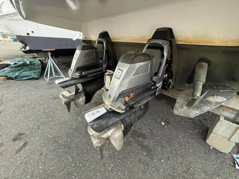 Slide: The Image of 2018 Monterey 298 Super Sport boat with dual outboard motors on dry dock. - 34