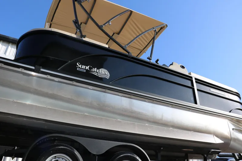 Slide: The Image of 2024 SunCatcher Select 320 RC pontoon boat with canopy, side view. - 15