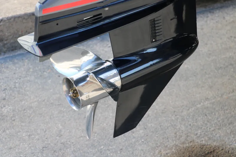Slide: The Image of 2024 SunCatcher Select 320 RC boat propeller, shiny metal blades, close-up view. - 16