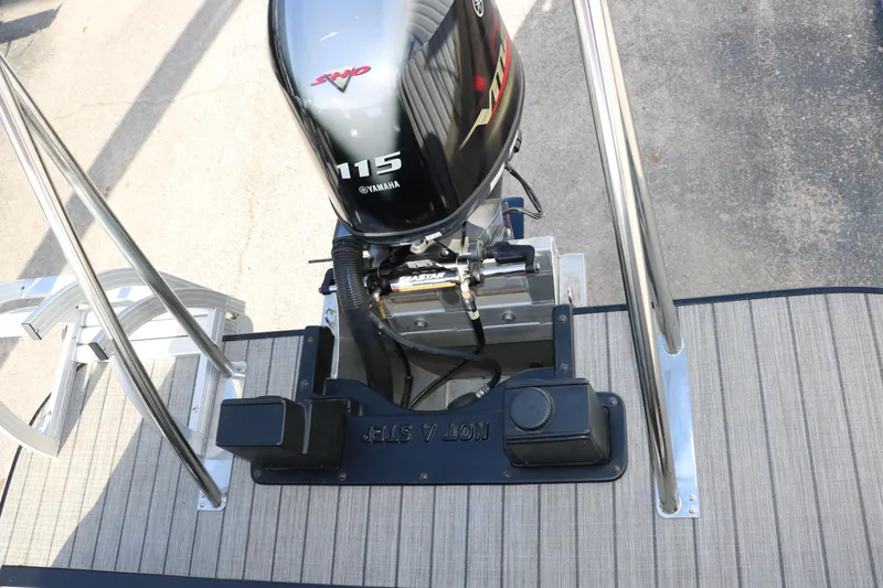Slide: The Image of 2024 SunCatcher Select 320 RC boat with Yamaha 115 engine, rear deck view. - 27